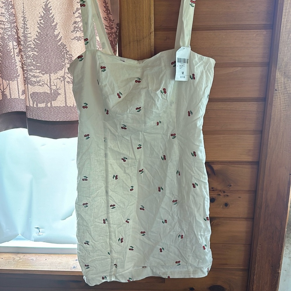 Forever 21 cherry white dress. STILL HAS TAGS!
